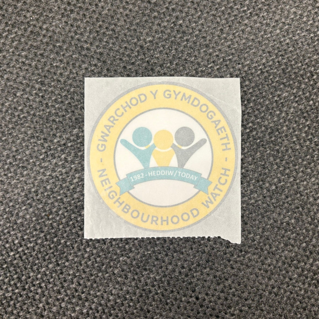 Pack of 50 Neighbourhood 'today' logo window stickers in Welsh/English, Alert logo on back